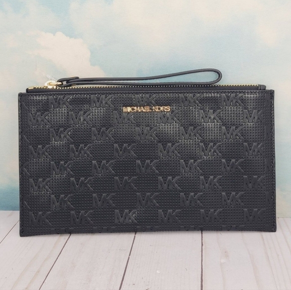 Michael Kors Handbags - Michael Kors Wristlet Embossed